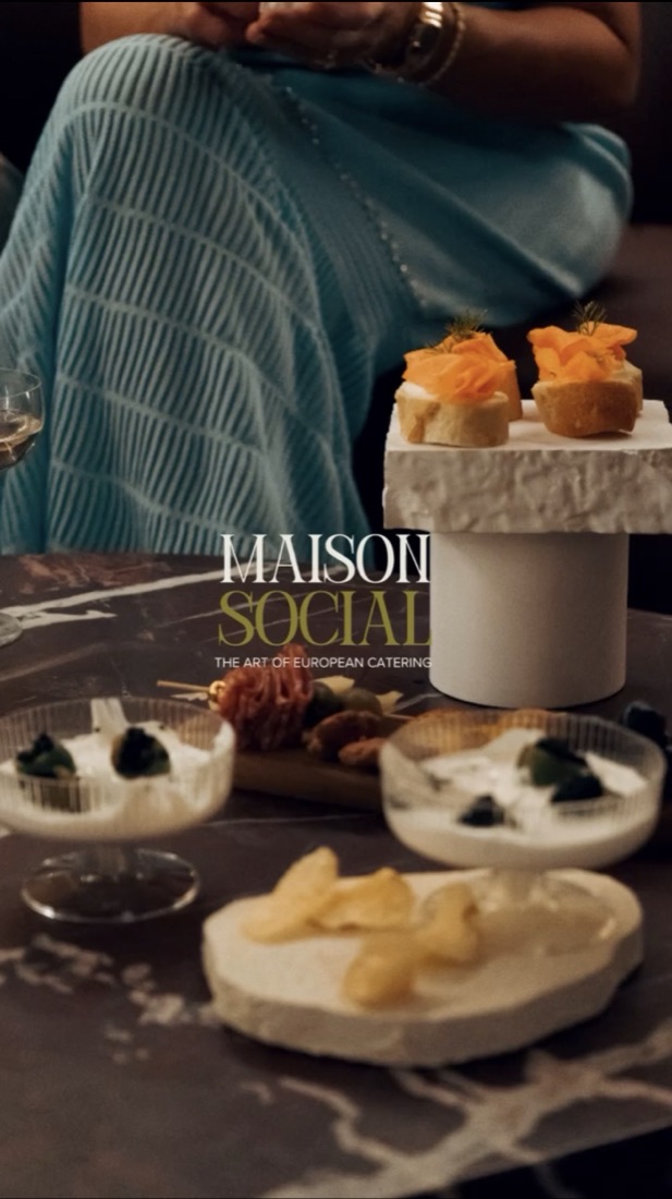 Maison Social catering spread with logo
